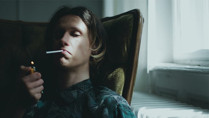 Man lighting a cigarette
