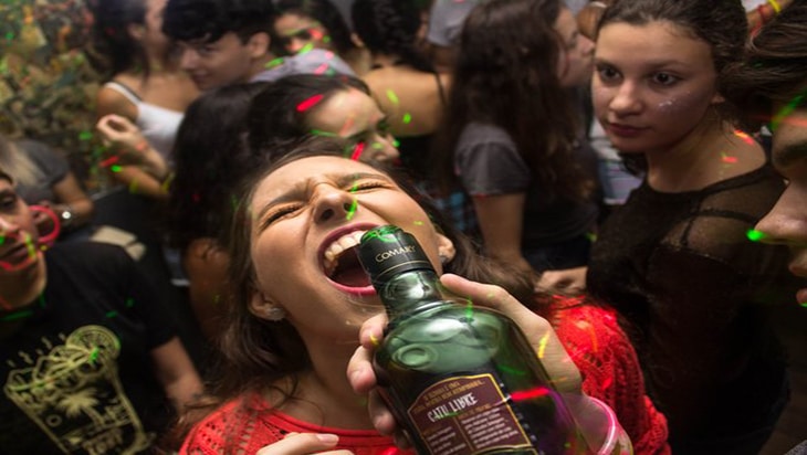 Drinking alcohol at a nightclub