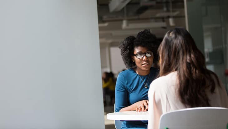 Two female colleagues having a meeting