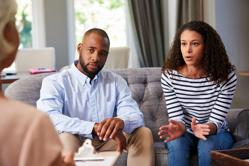 Young couple attending partner therapy 
