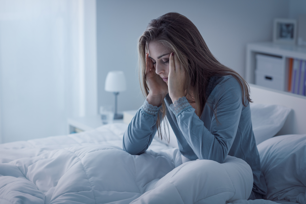 Woman who can’t sleep due to anxiety.