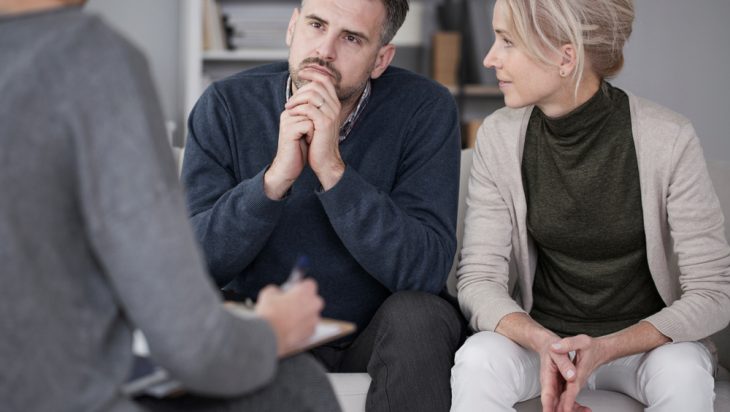 Man and woman taking partner therapy