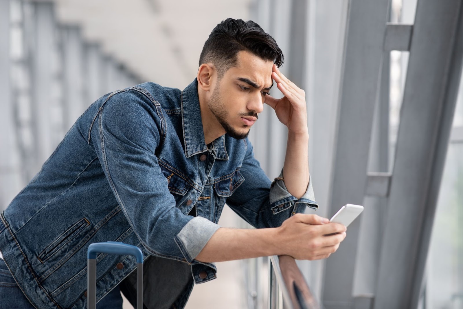 A man who is upset after doomscrolling