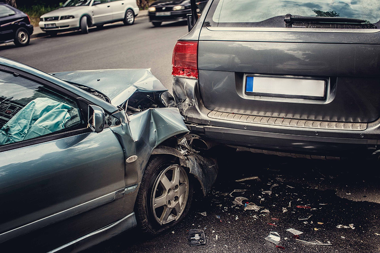 A collision between two cars because of impaired driving