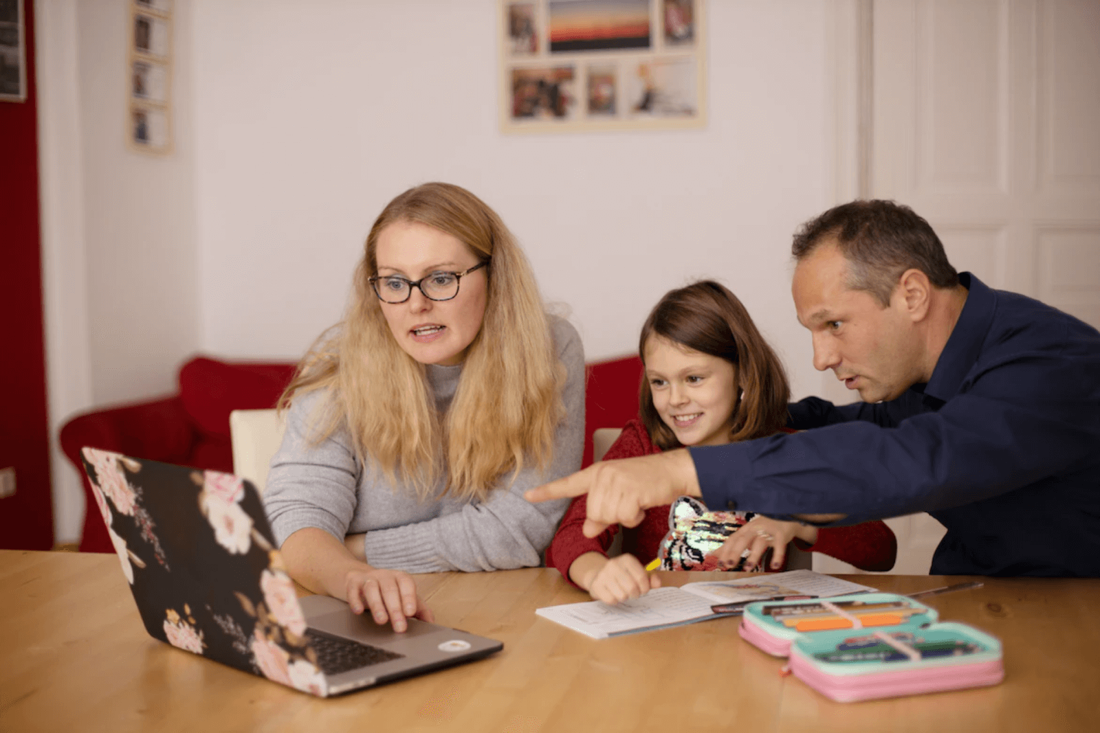 Parents showing their child a video about mental health
