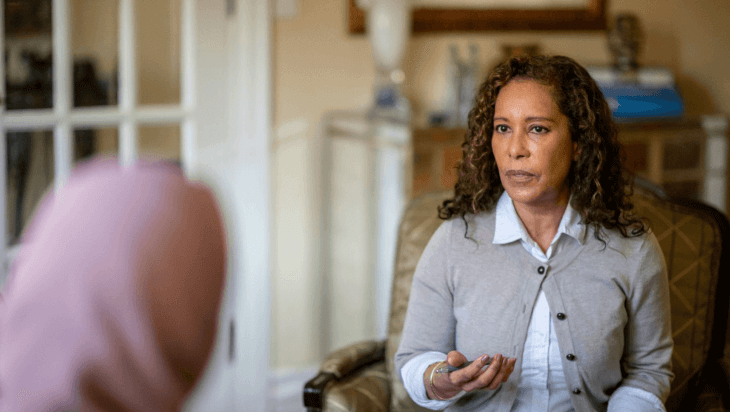 A therapist in the middle of a counselling session.