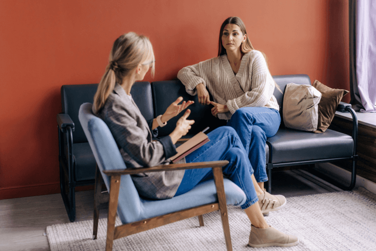 a woman attending cognitive behavioural therapy
