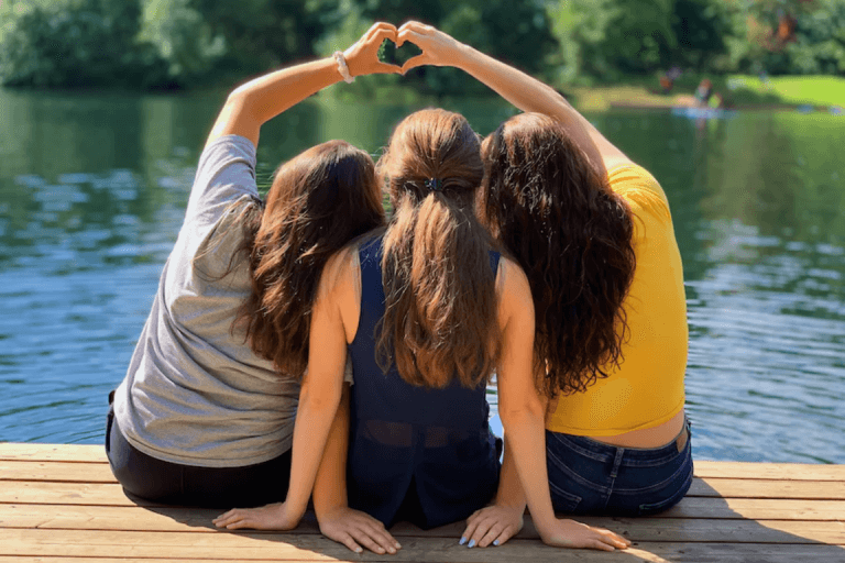 A group of friends by the water.