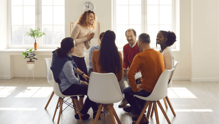 People engaging in a group therapy session.
