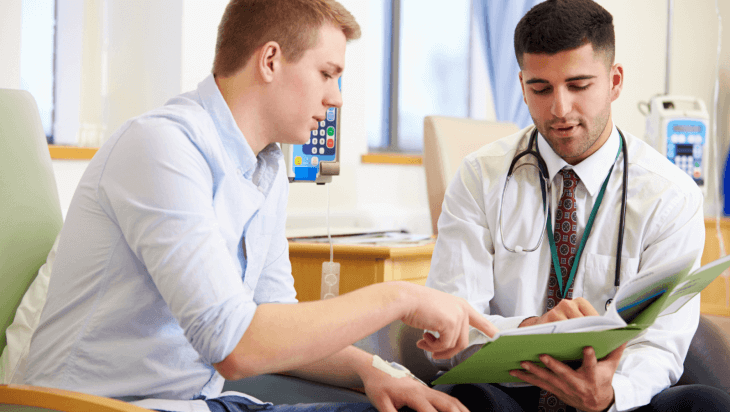 A patient reviews his options with a doctor.