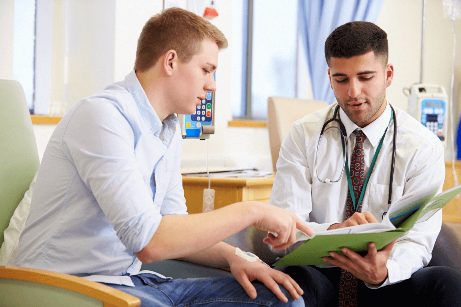 A patient reviews his options with a doctor.