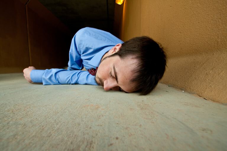 a man passed out on the floor