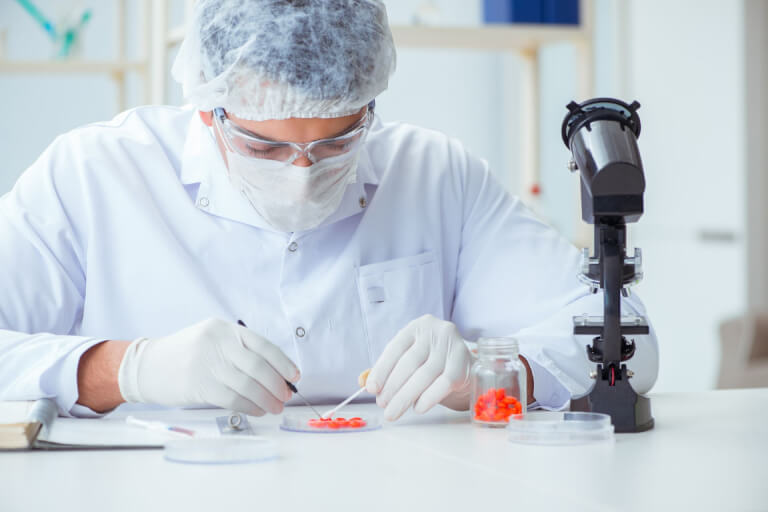 A doctor conducting a drug screening test.