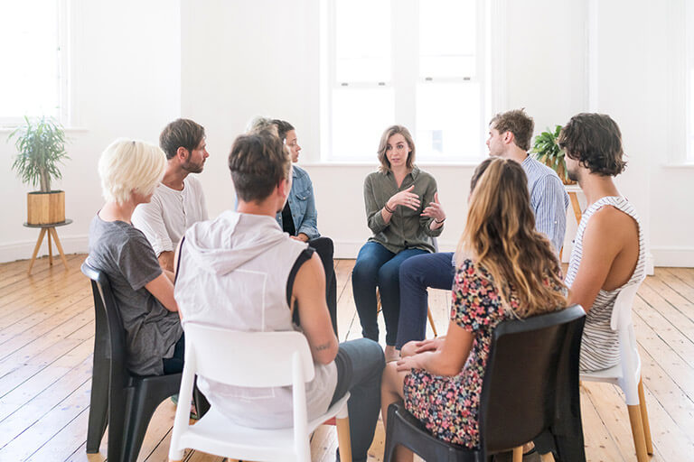 A group of people in treatment for addiction