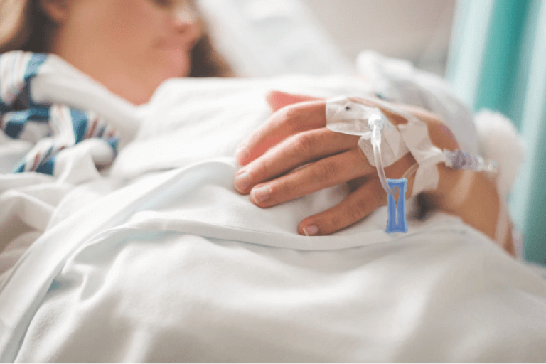 A patient receiving an IV treatment.
