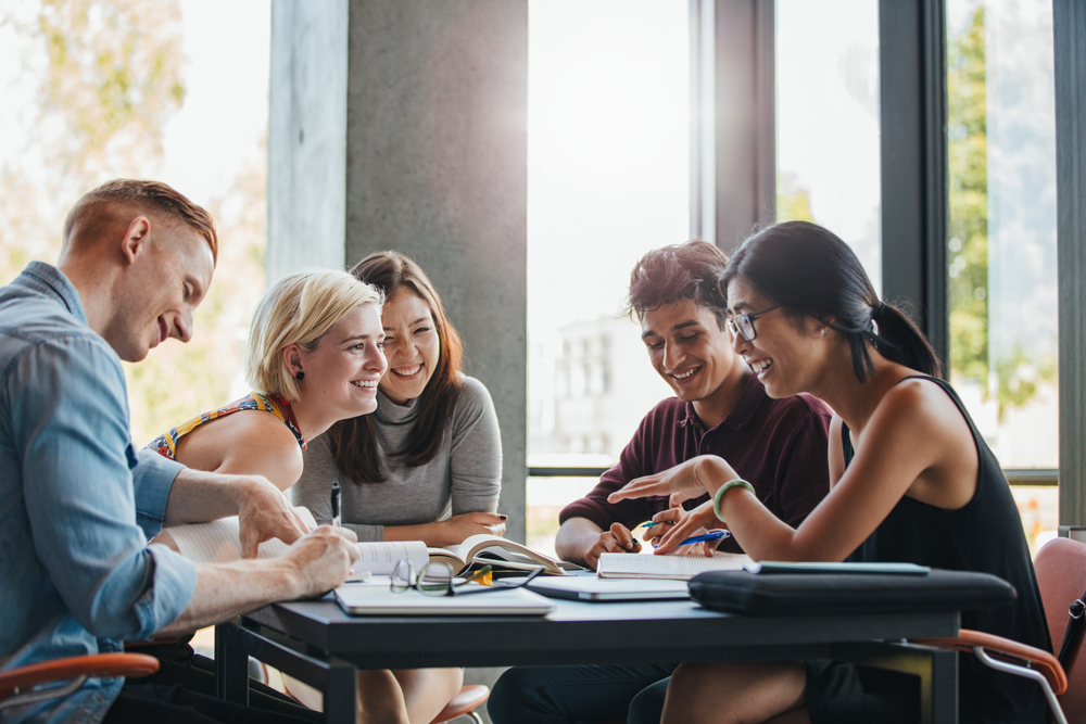 A group of young students studying together