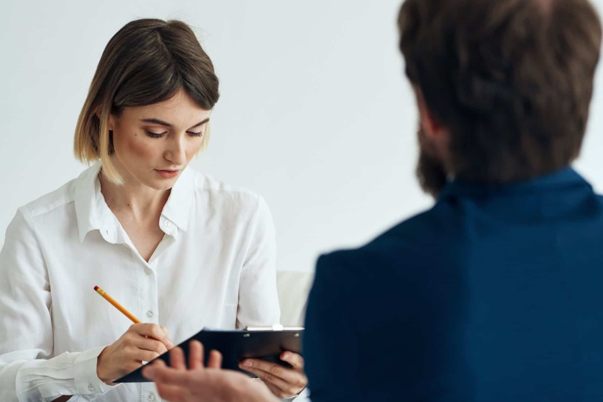 A consultation between a psychiatrist and a patient