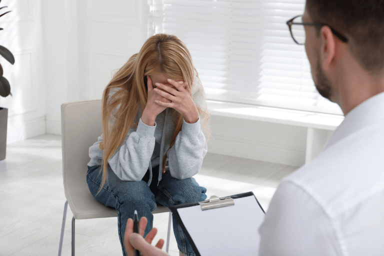 A woman talking to their therapist.